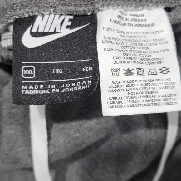 Nike Men's Sportswear Club Fleece Graphic Shorts in gray with a white Swoosh log - Picture 4 of 5